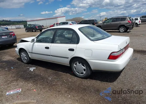 1996 Toyota Corolla Dx z USA, uszkodzony, nr VIN 1NXBB02E5TZ455639